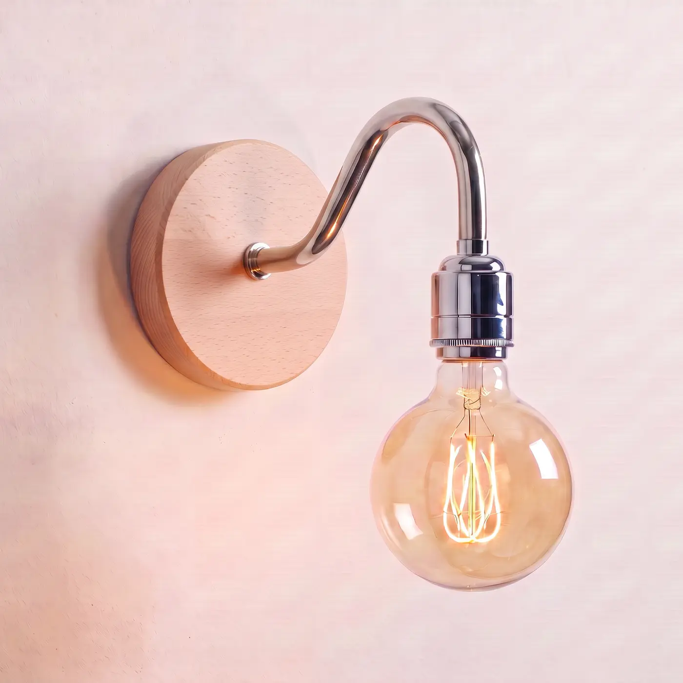 Swan neck wall light with a beech back plate, chrome swan neck arm and matching bulb holder, lit with a globe filament bulb